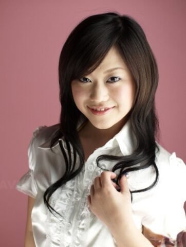10558035_006_80ea Cute Japanese model Minako Oyama poses non nude in a blouse and skirt