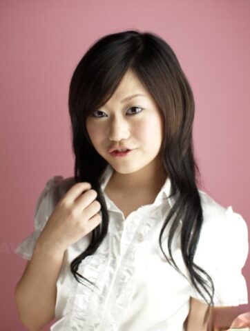 10558035_008_a62f Cute Japanese model Minako Oyama poses non nude in a blouse and skirt