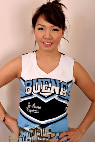 13314818_001_d56b Amateur Asian solo girl sheds cheerleader uniform to bare tiny teen tits