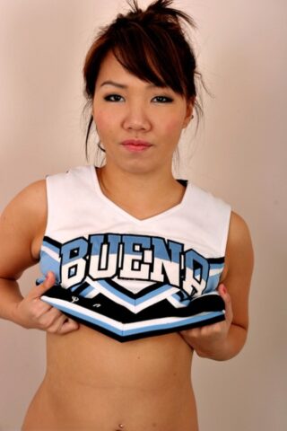 13314818_006_2478 Amateur Asian solo girl sheds cheerleader uniform to bare tiny teen tits