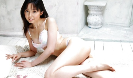 13766627_003_8832 Foxy asian babe Yui Hasumi stripping off her lingerie on the bed