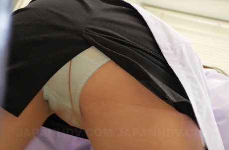 15674935_018_b87b Clumsy Japanese nurse grabs her patient
