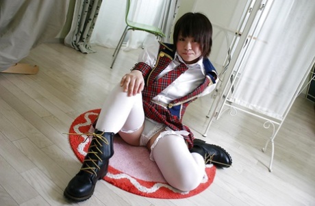 15892688_004_284a Asian schoolgirl Mayu Nakane revealing her nice ass and inviting gash
