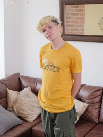 Cute blond twink Melo Prince doffs his pink undies and pulls out his fat dick