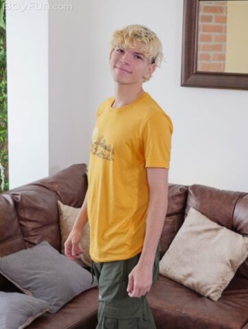 Cute blond twink Melo Prince doffs his pink undies and pulls out his fat dick