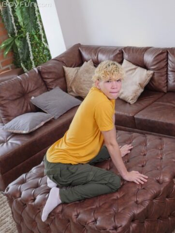 Cute blond twink Melo Prince doffs his pink undies and pulls out his fat dick