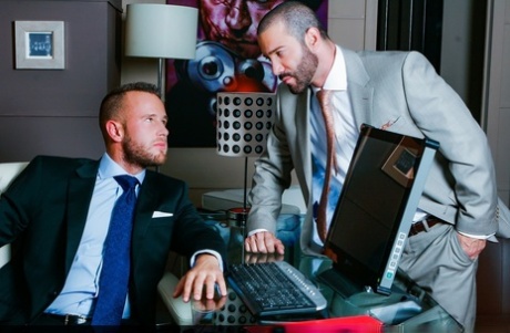 Gay businessmen Ben Brown & Junior Stelliano having intense sex at the office