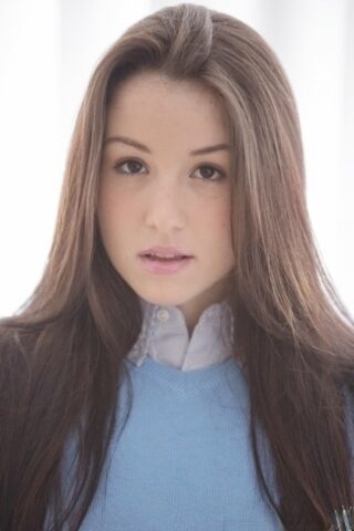 Pretty latina schoolgirl Lola Foxx uncovering her tempting curves