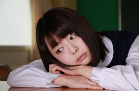 26262946_002_a0ca Adorable Japanese coed Tomoyo Isumi gets naked in socks aboard her desk