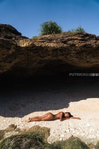 26291389_008_703b Indonesian babe Tita Sahara shows her sexy body while sunbathing on the beach