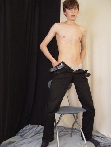 Barely legal gay brunette Thomas strips naked & plays with his big dick