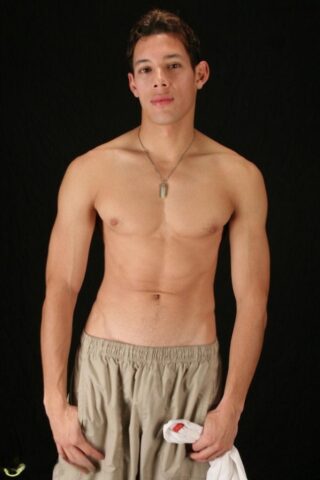 Handsome gay Latino Carlos Ramos undresses and jacks off his big cock