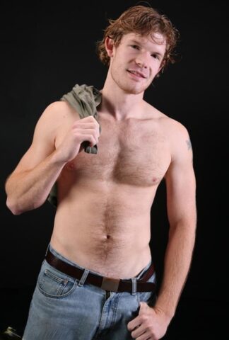 Ginger model Riordan undresses and unveils his hairy body and hard dick