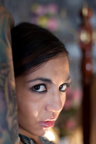 43351459_010_0940 Tattooed brunette chick Holly D teasing her mans big dick in erotic fashion