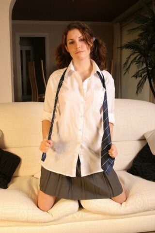 44323338_143_ca18 Pigtailed teen Carolyn strips off her clothes & exposes her boobs & fuzzy cunt