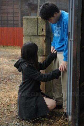 44328106_003_7e88 Asian honey Mai Shimizu kneels in front of a guy and gives head outdoors