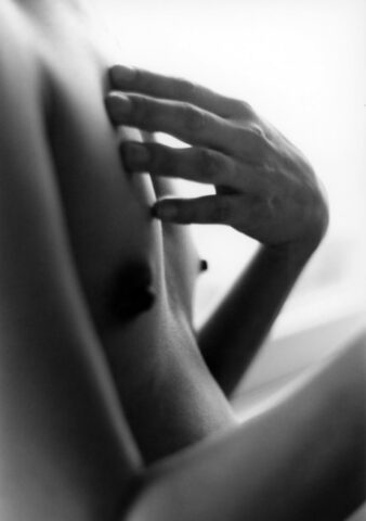 Asian babe shows her petite body & her tiny tits in a black & white scene