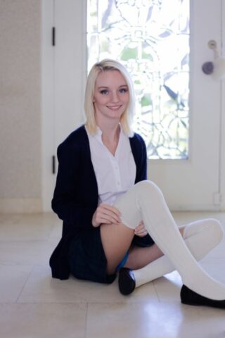 45264796_004_4972 Delicious blonde Sammie Daniels strips to her socks and plays piano