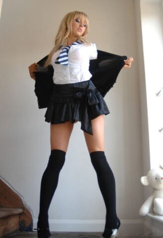 47913247_010_d9f0-1 Adorable babe in black socks Elle Parker taking off her school uniform