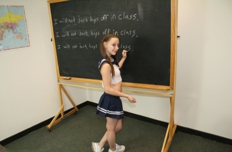 48773236_003_5d3f Little teen giving her tall blonde teacher a great handjob in the classroom