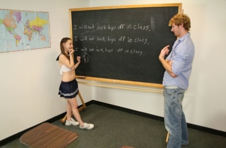 48773236_022_c0d0 Little teen giving her tall blonde teacher a great handjob in the classroom