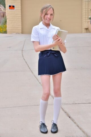 50572431_001_d276 Delicious blonde schoolgirl likes spreading her twat and ramming it