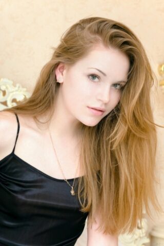 51295728_054_46d8 Beautiful teen Mendes A exposes her tiny boobs and poses naked on a bed