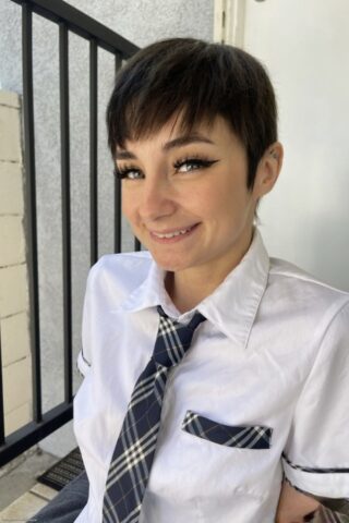 53507536_003_ee2d Brunette schoolgirl Stevie Moon shows her shaved puffy pussy up close