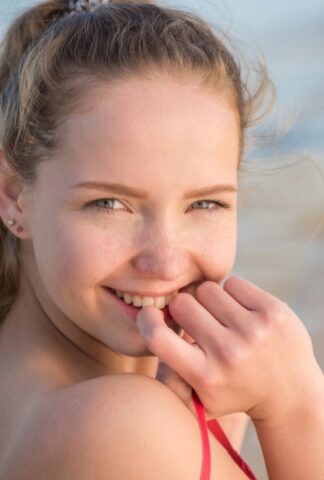 55067677_008_6a94 Adorable teen with a slim body Faina Bona shows her cunt on the beach