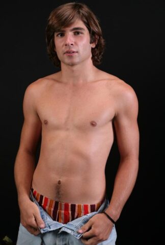 Long haired gay dude Dane shows his big dick and hot bum on a bed
