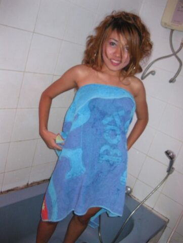 59359827_005_962c Cute Thai girl with a shaved pussy takes a shower before sex with a Farang