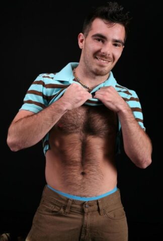 Hairy gay bear Colton shows off his hairy chest and dick before jerking