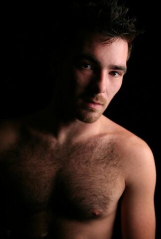 Hairy gay bear Colton shows off his hairy chest and dick before jerking