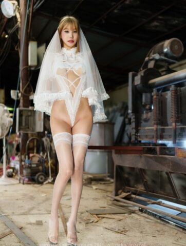 Stunning South Korean bride poses in her sexy white lingerie and heels