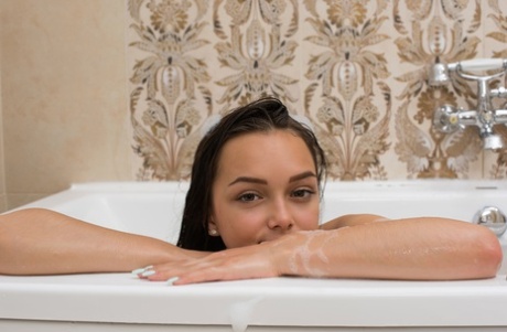 65909069_074_905e Beautiful teen babe Slava shows her hot body during her bubble bath