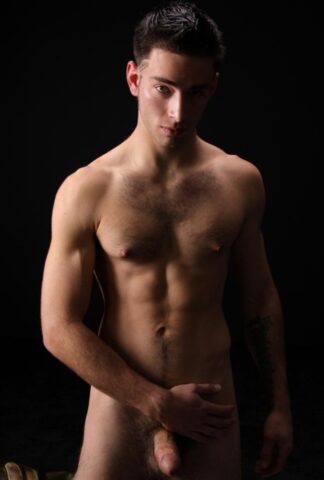 Brunette hunk Ramsey shows off his strong naked body & his hairy dick