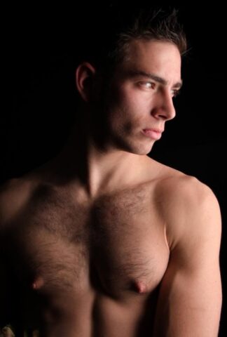 Brunette hunk Ramsey shows off his strong naked body & his hairy dick