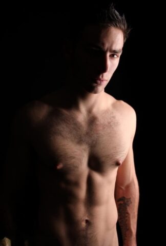 Brunette hunk Ramsey shows off his strong naked body & his hairy dick