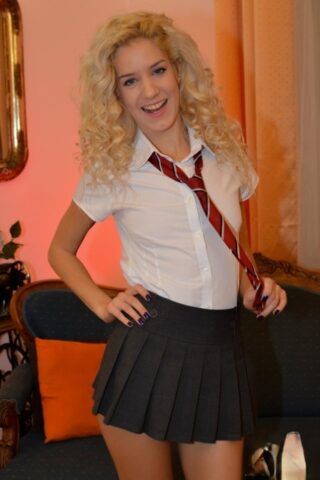 67588142_005_0a03 Blonde schoolgirl Monique Woods shows her small ass and poses in a solo