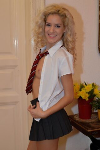 67588142_043_1213 Blonde schoolgirl Monique Woods shows her small ass and poses in a solo