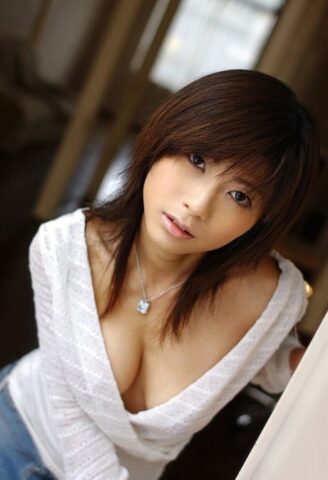 67938688_003_8794 Beautiful Japanese girl Rin Suzuka lets a firm breast loose during solo action
