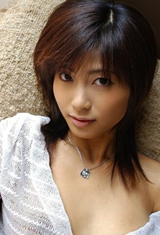 67938688_005_a2e6 Beautiful Japanese girl Rin Suzuka lets a firm breast loose during solo action