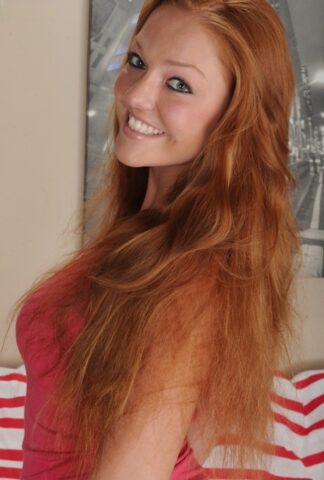 69076339_001_2687 Redhead amateur babe Farrah Flower spreading her shaved teen vagina