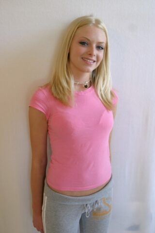 69618044_004_af95 Cute teen girl Skye Model hangs out in a pink shirt and her yoga pants