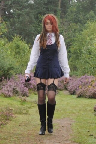 69801167_019_daef Tall schoolgirl shows off her hot legs in stockings and boots outdoors