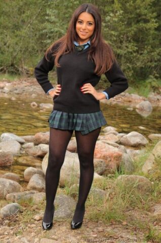 69805151_003_2c87 Hot babe in pantyhose Charley S flaunts her sexy big tits by the river
