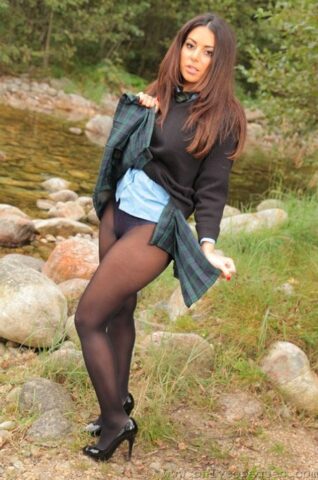 69805151_056_1f1c Hot babe in pantyhose Charley S flaunts her sexy big tits by the river