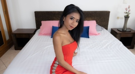 69958478_002_27a9 Petite babe Som takes off her sexy outfit & shows her protruding labia