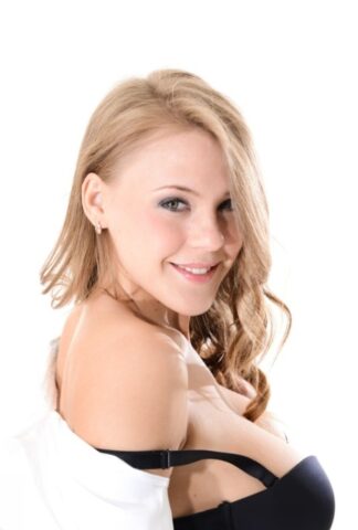 71639992_005_65eb Cute blonde coed Lilly Mays takes off her uniform in white stockings