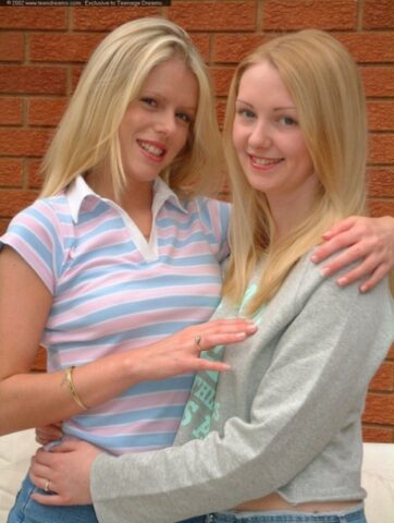Pretty lesbian Natalie & her sexy GF show off their sweet tits & big bums